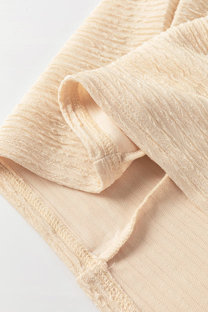 Light Pink Solid Textured Ruffled Short Sleeve Blouse